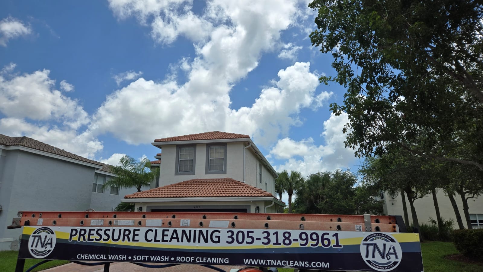 Tile-roof home prepped for pressure cleaning and soft wash