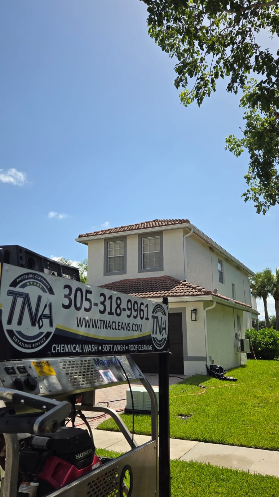 Residential roof and exterior cleaning with TNA equipment on site
