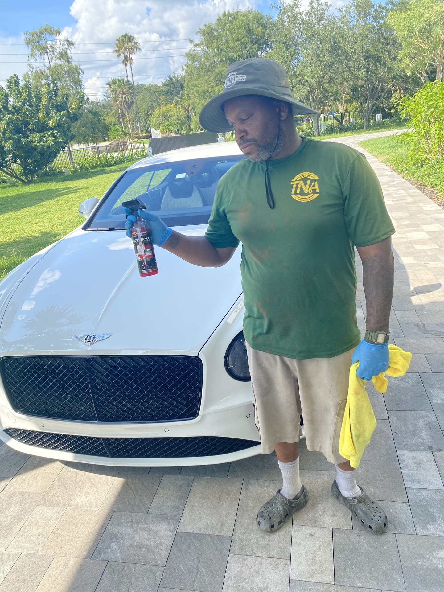 Detailing a white Bentley with professional products