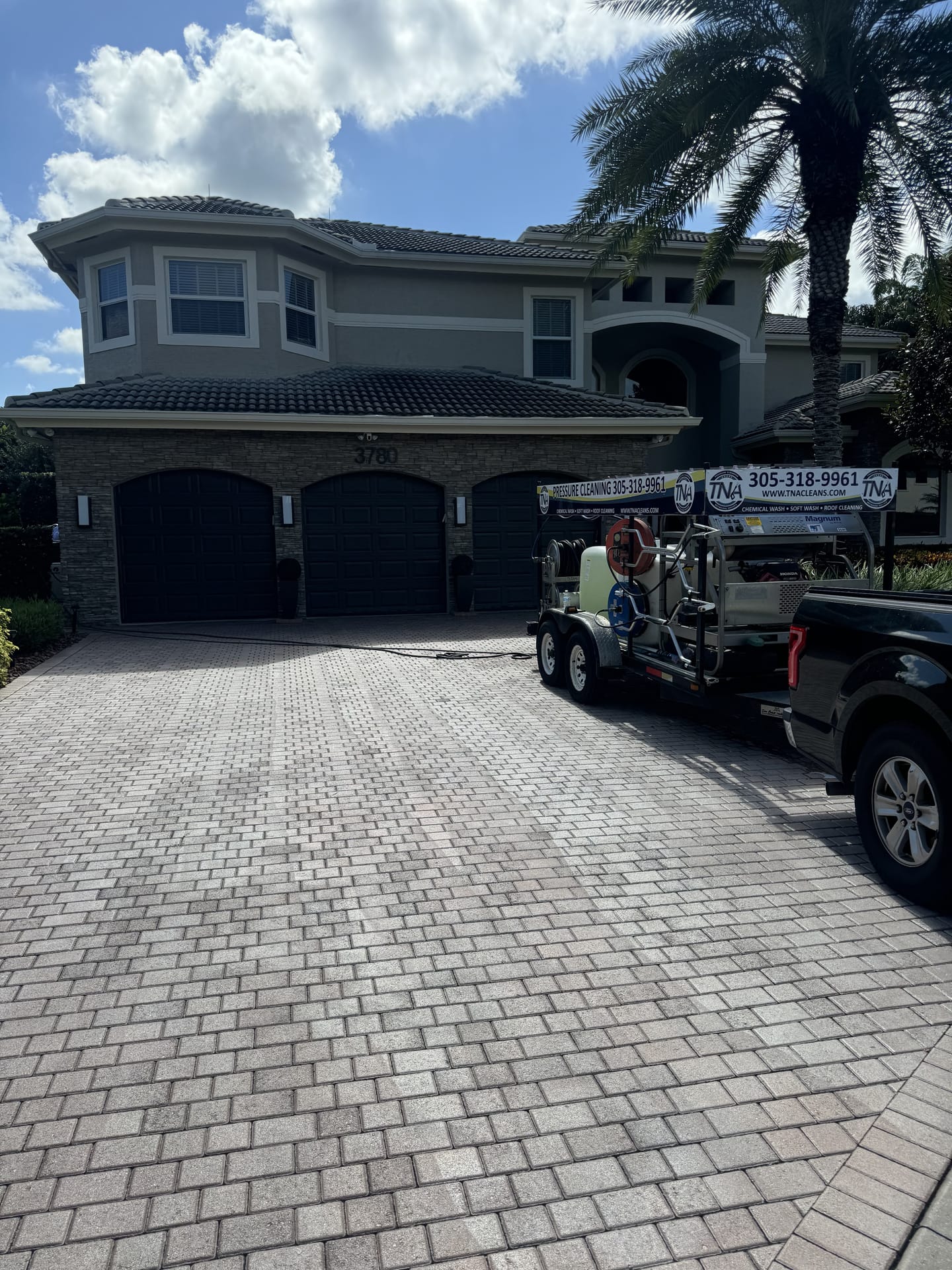 Estate driveway and home exterior cleaned by TNA