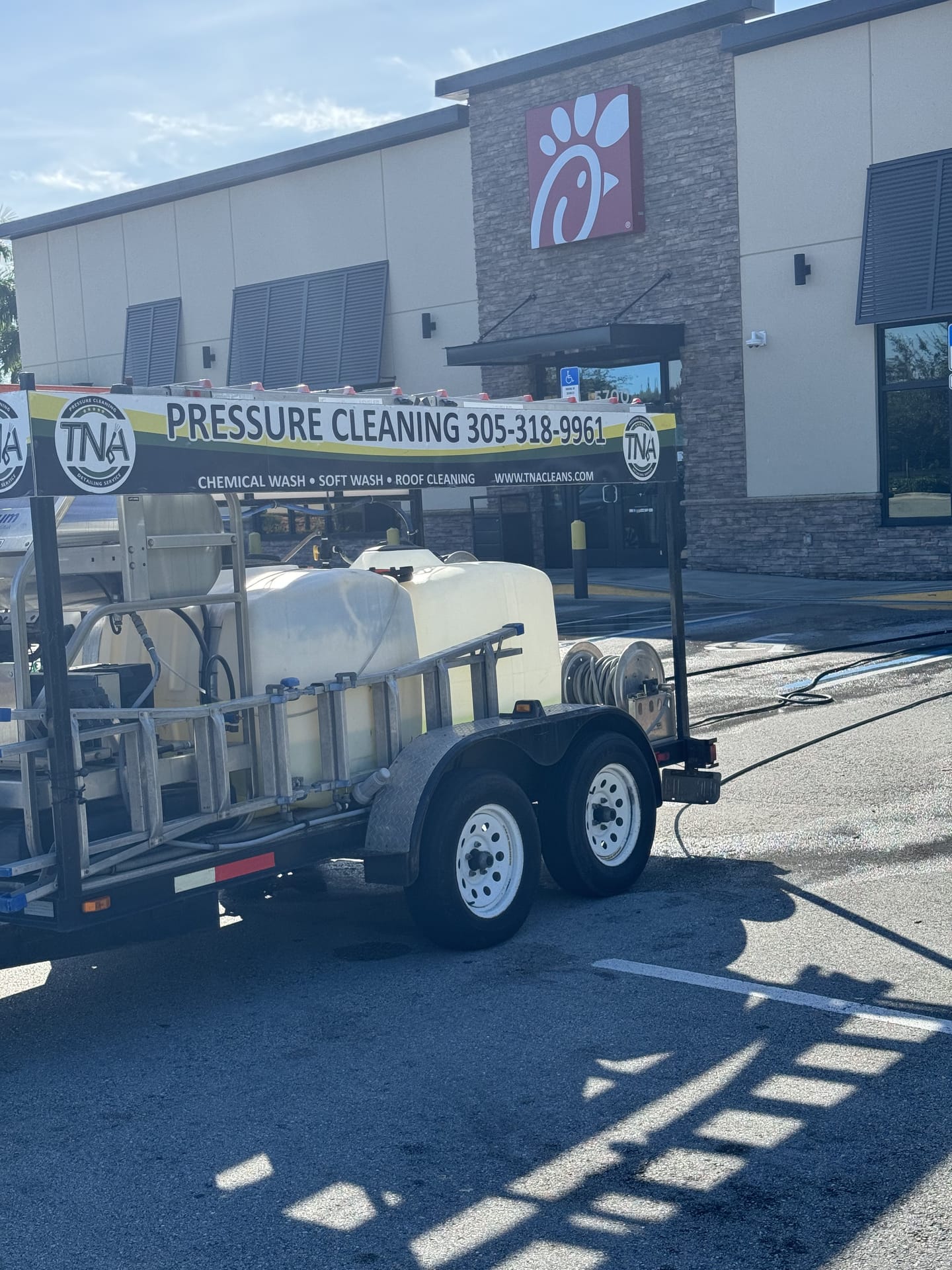 TNA pressure cleaning trailer at a Chick-fil-A location