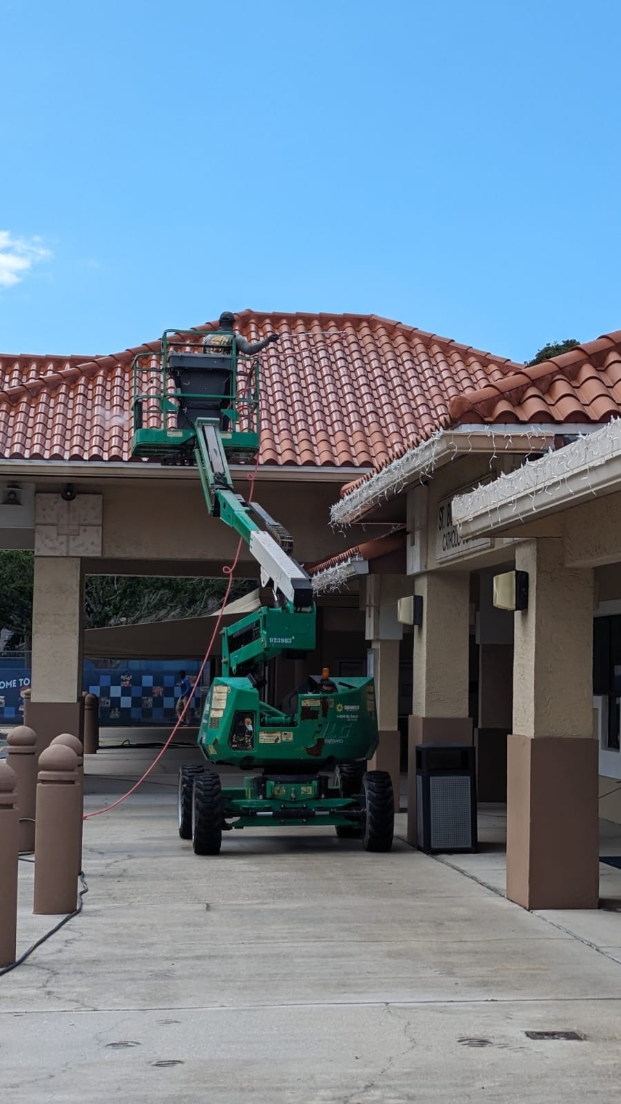 Boom-lift roof soft wash at St. Bonaventure Catholic School