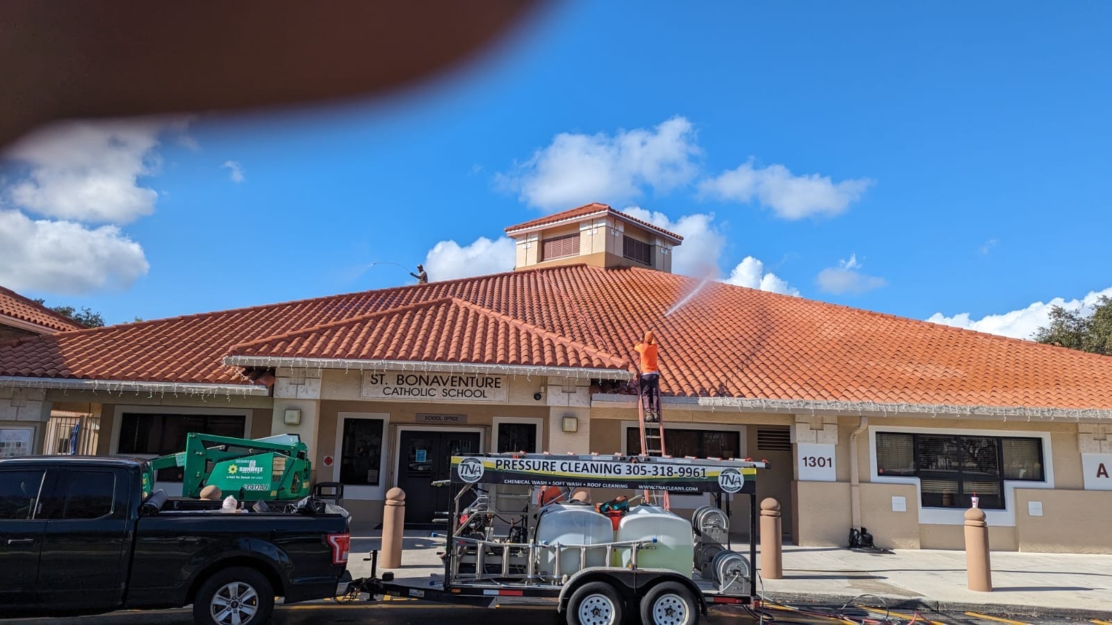 Commercial tile roof before and after at a Catholic school