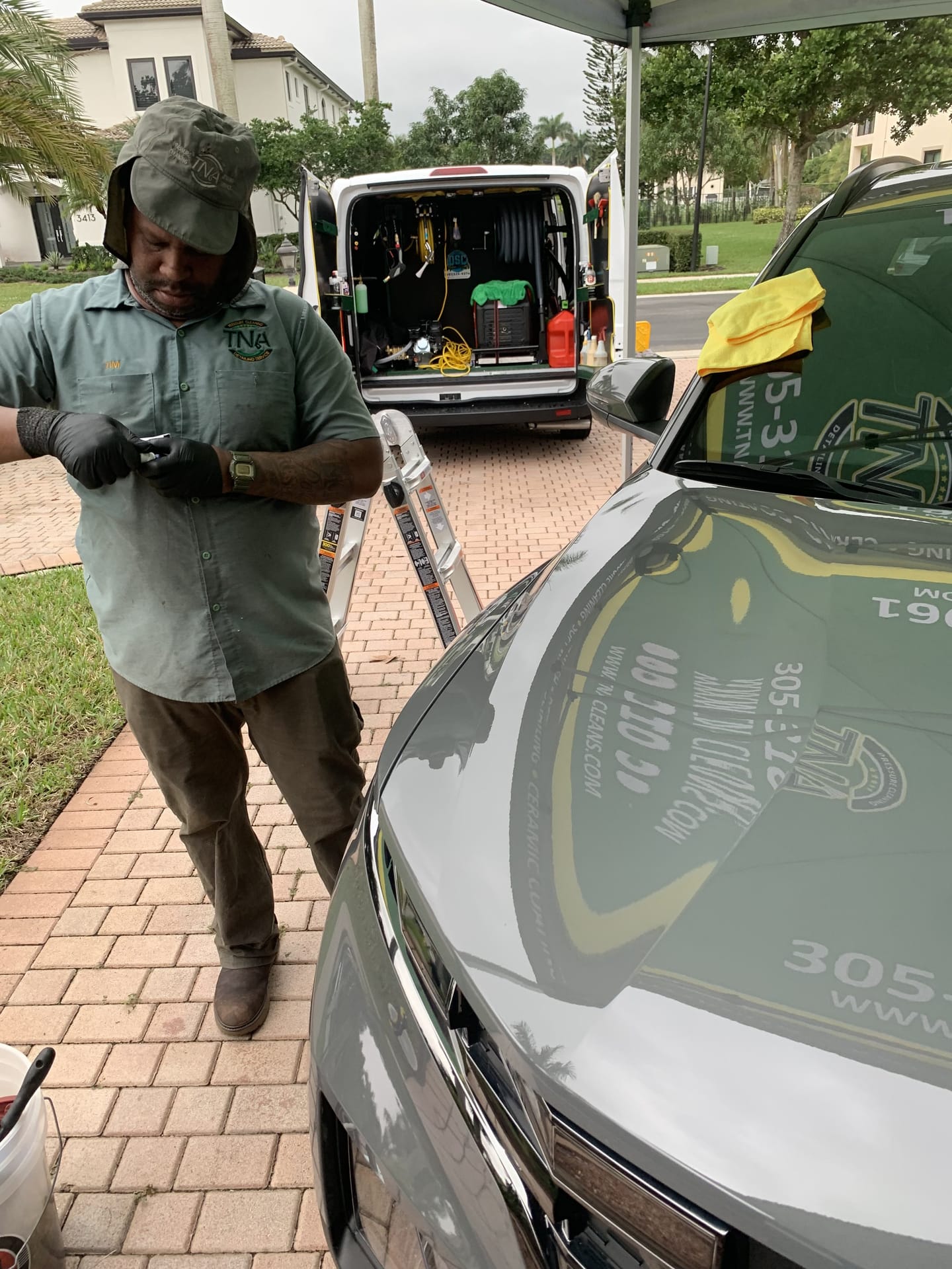 TNA mobile detailing setup at a residential driveway