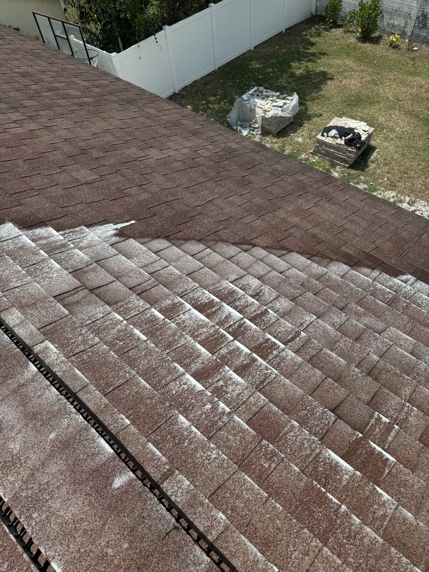Shingle roof before and after a TNA soft wash